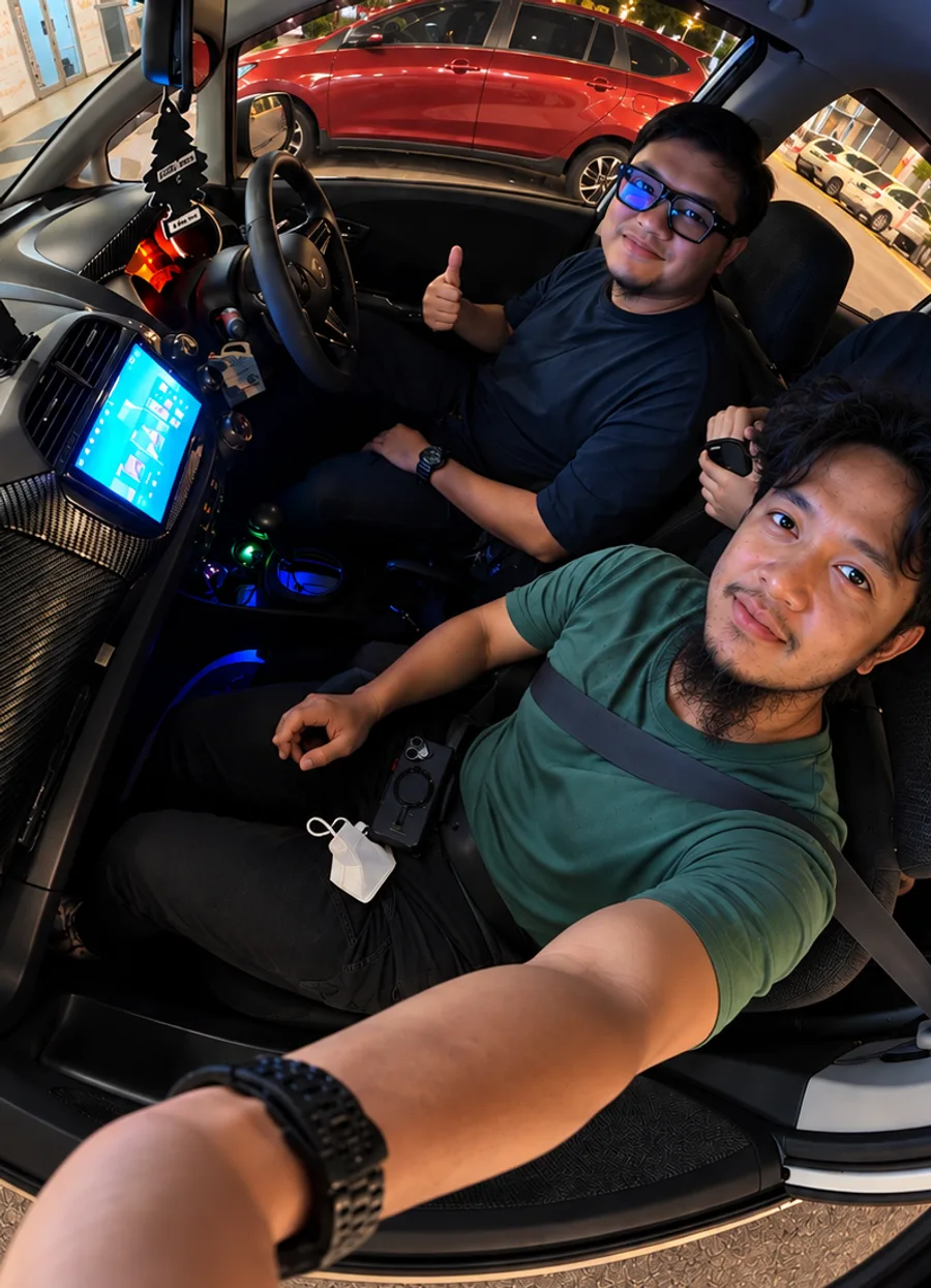 BatamGems founders Redo and Agus Theo in the car on a Batam road trip