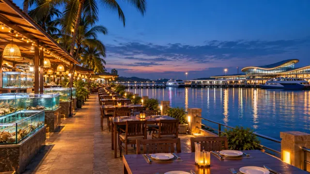 Illustration: waterfront seafood restaurants with string lights along a marina at blue hour