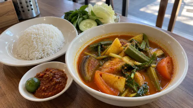 Illustration: vegetable asam pedas with rice and sambal