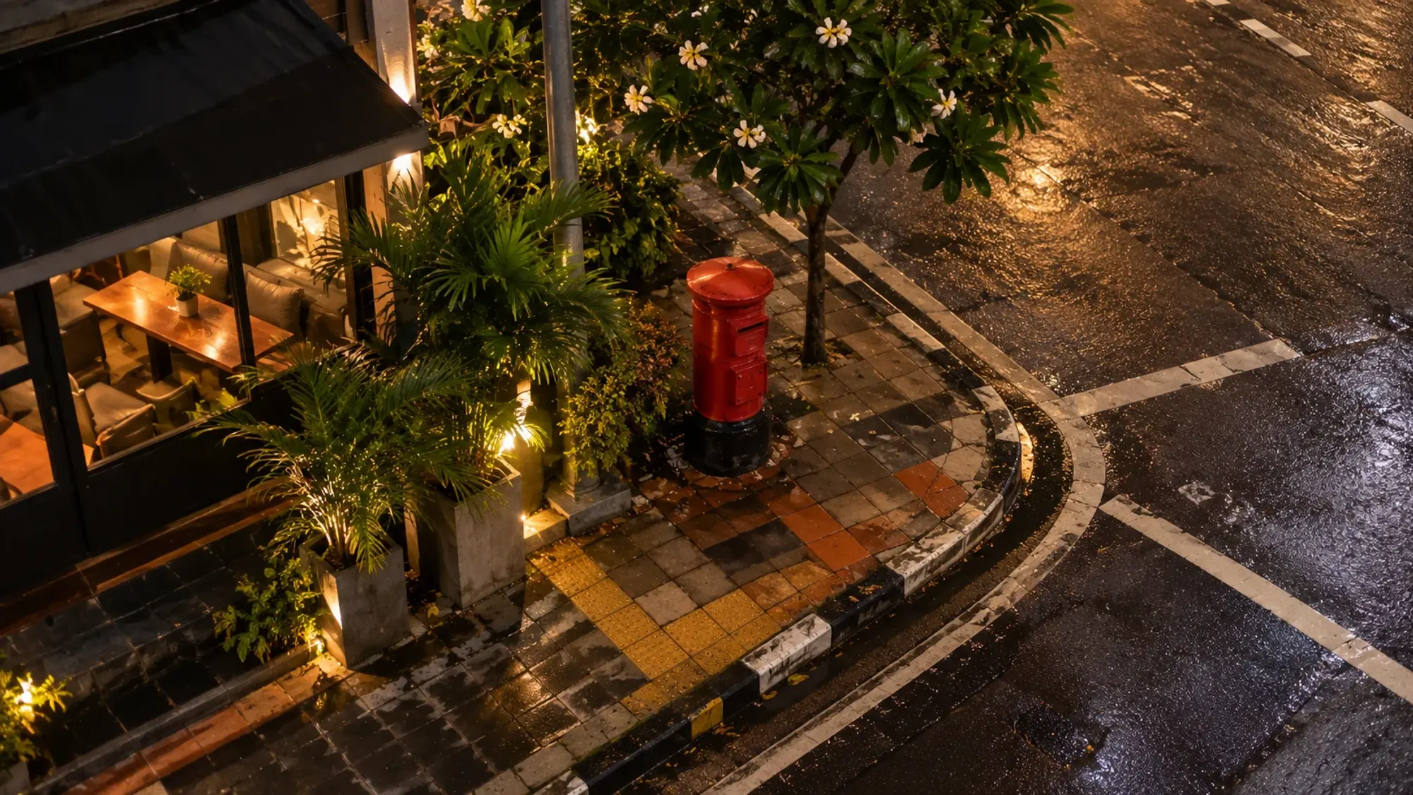 A postbox on a quiet Batam street corner