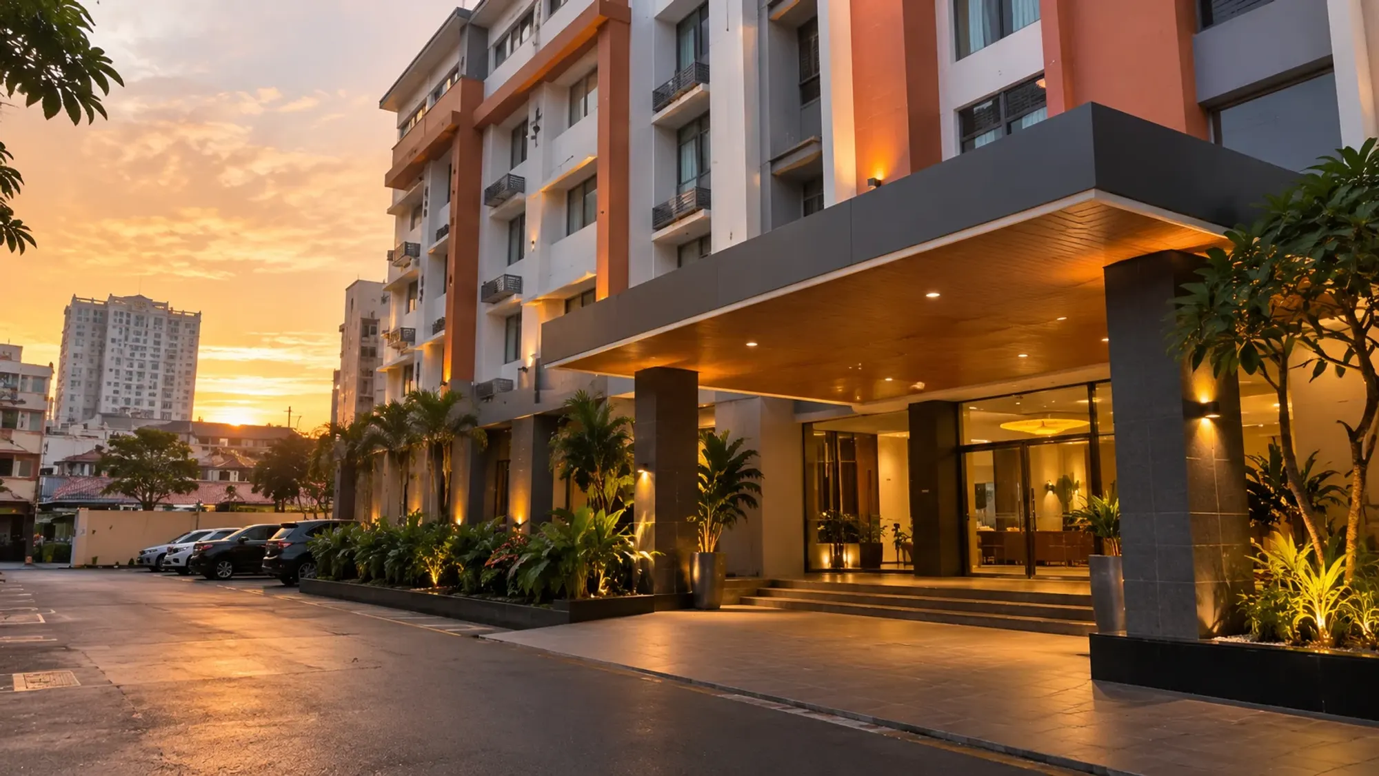 The building exterior and entrance at golden hour of a 2-star budget hotel — Batam 1 Hotel, a 2-star budget hotel in Nagoya, Batam