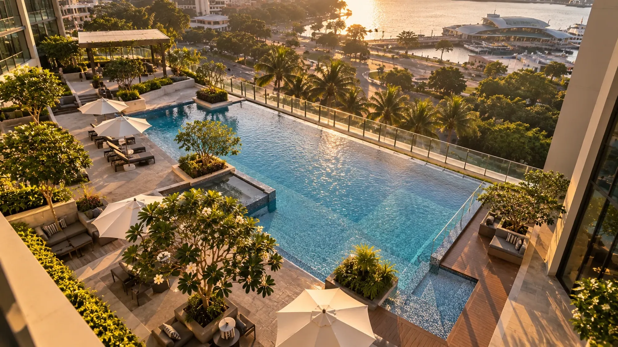 The swimming pool area in late afternoon of a 4-star city hotel — Harmoni, a 4-star city hotel in Nagoya, Batam