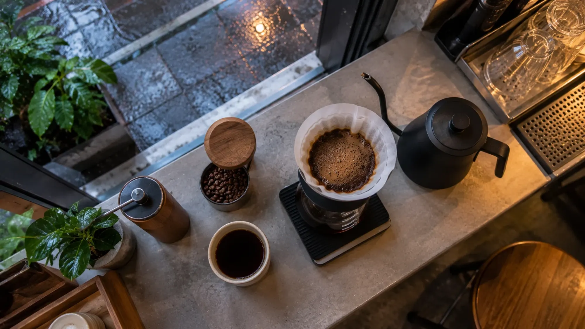A hand-brew coffee set-up on a minimalist café counter — Hoods Coffee, a café in Batam Centre, Batam