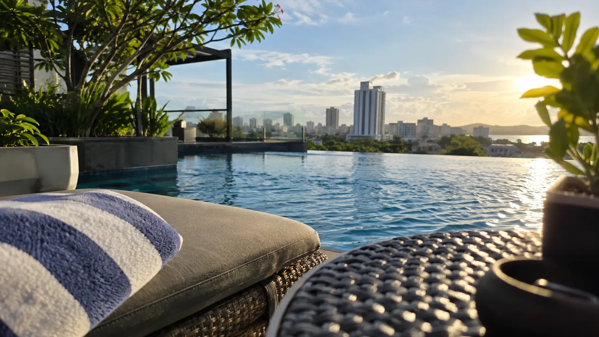 The swimming pool area in late afternoon of a 4-star city hotel — I Hotel, a 4-star city hotel in Nagoya, Batam