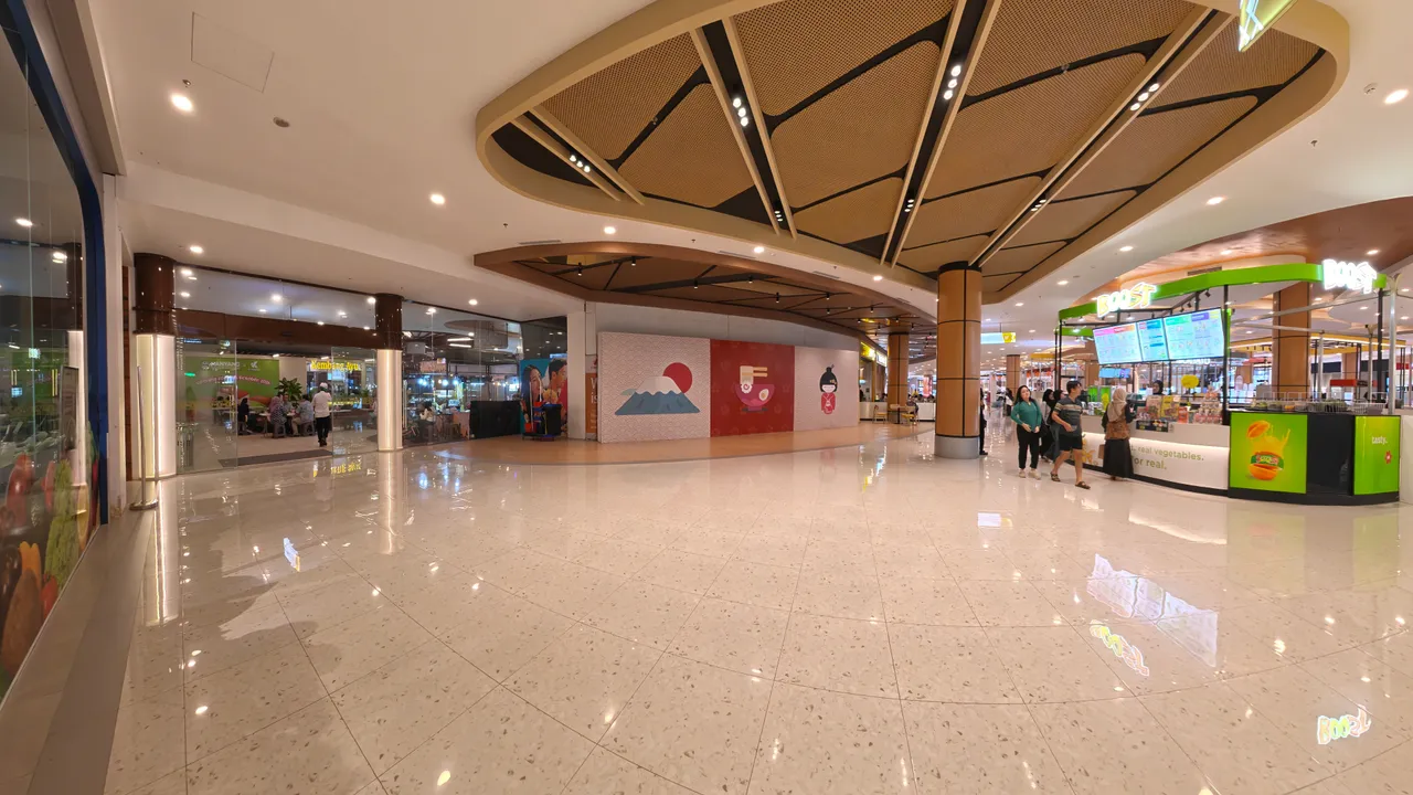 K Square Batam — Japanese-themed food corner with Mount Fuji murals and a drinks kiosk